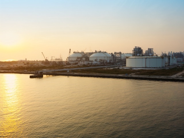 LNG regasification terminal on the Indian coast at sunrise