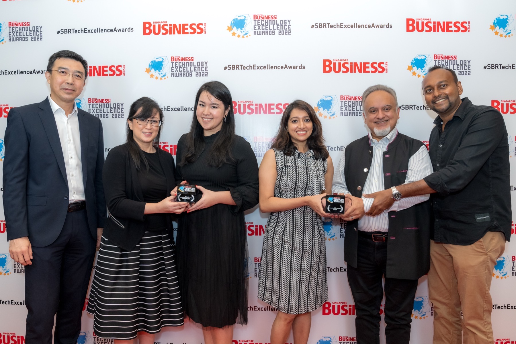The entomo team accepting the Technology Excellence Award at the Singapore Business Review Awards 2022 in Singapore